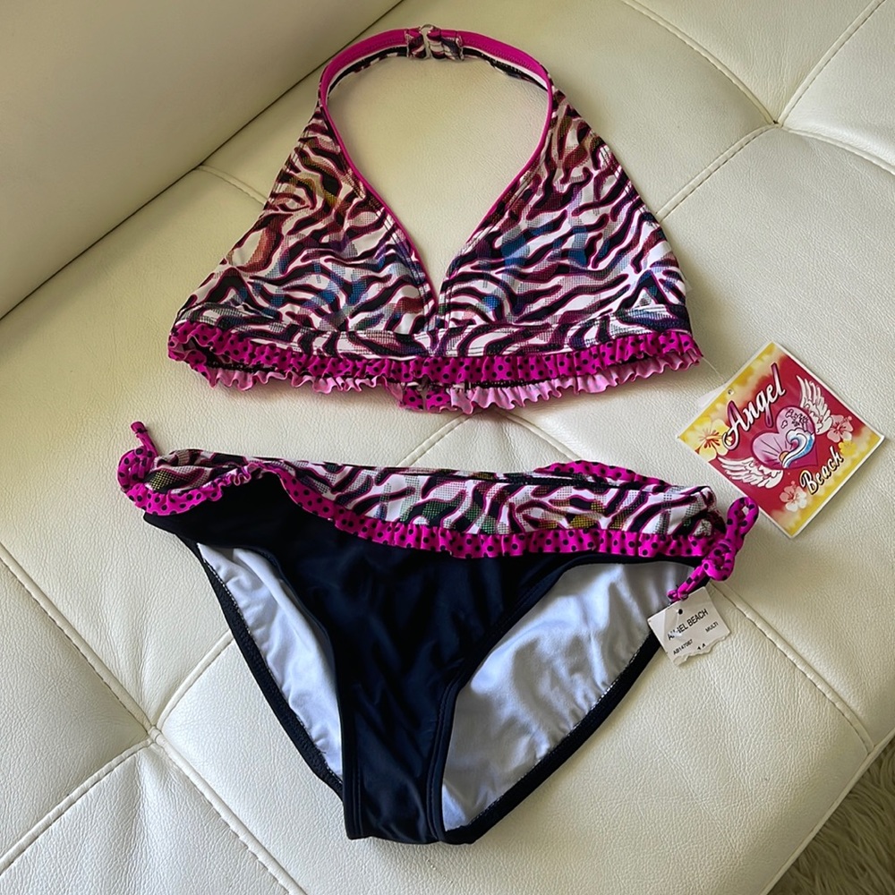 The brand is Angel Beach and it’s brand new! Never used